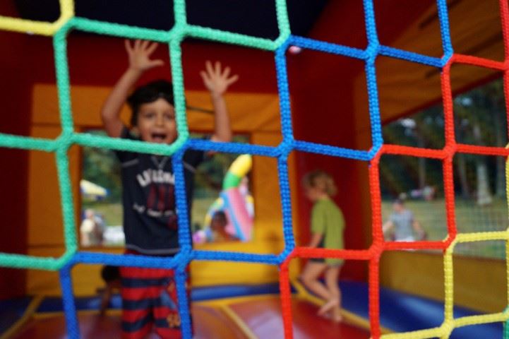 Float parade marches around the family aquatic center