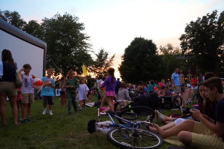 Movie-goers enjoy another movie night on the Village Green