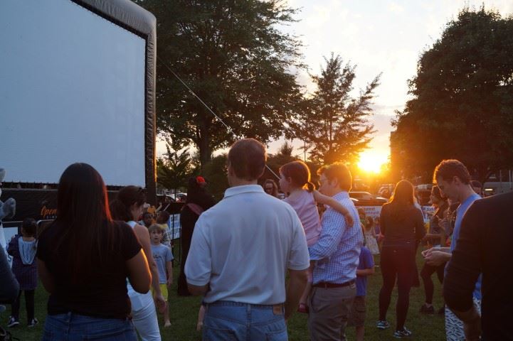 The sun sets over another movie night on the Green